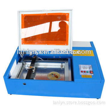 china supplier looking for agent in canada rubber mini 40w laser cutting and engraving machine